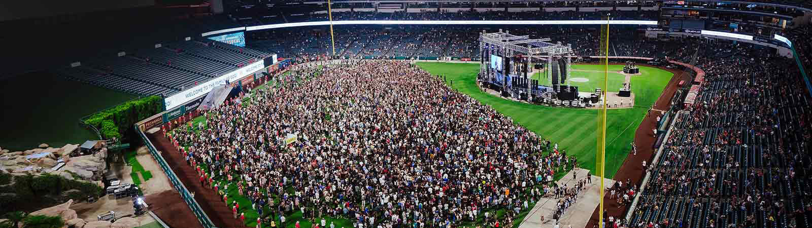 Thousands walk on Angel Stadium's field at the 2018 SoCal Harvest