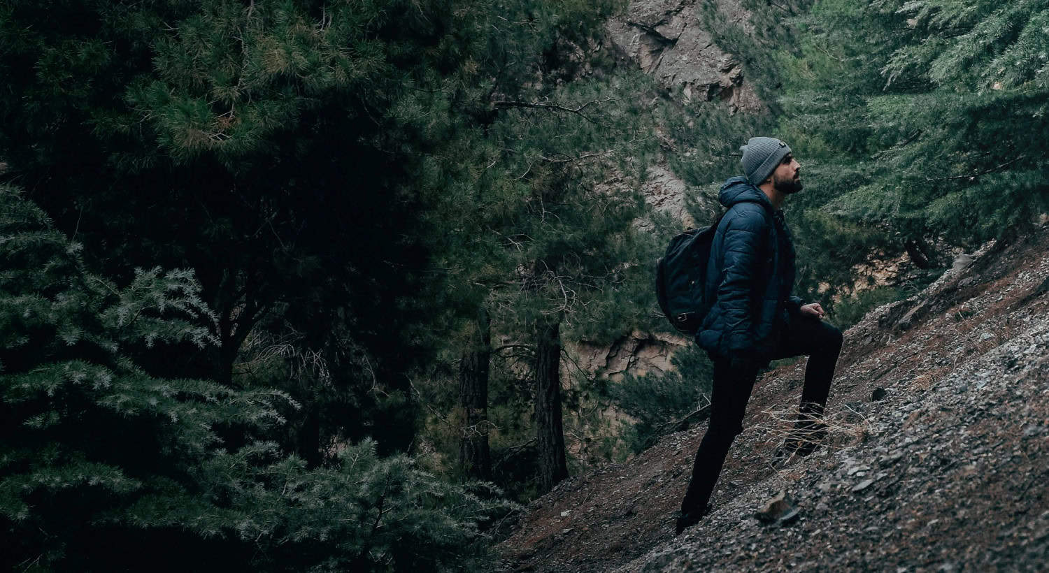 Background image of a person hiking.