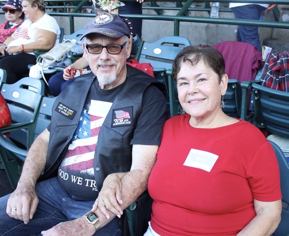 Navy Veteran sitting next to wife at SoCal Harvest 2019