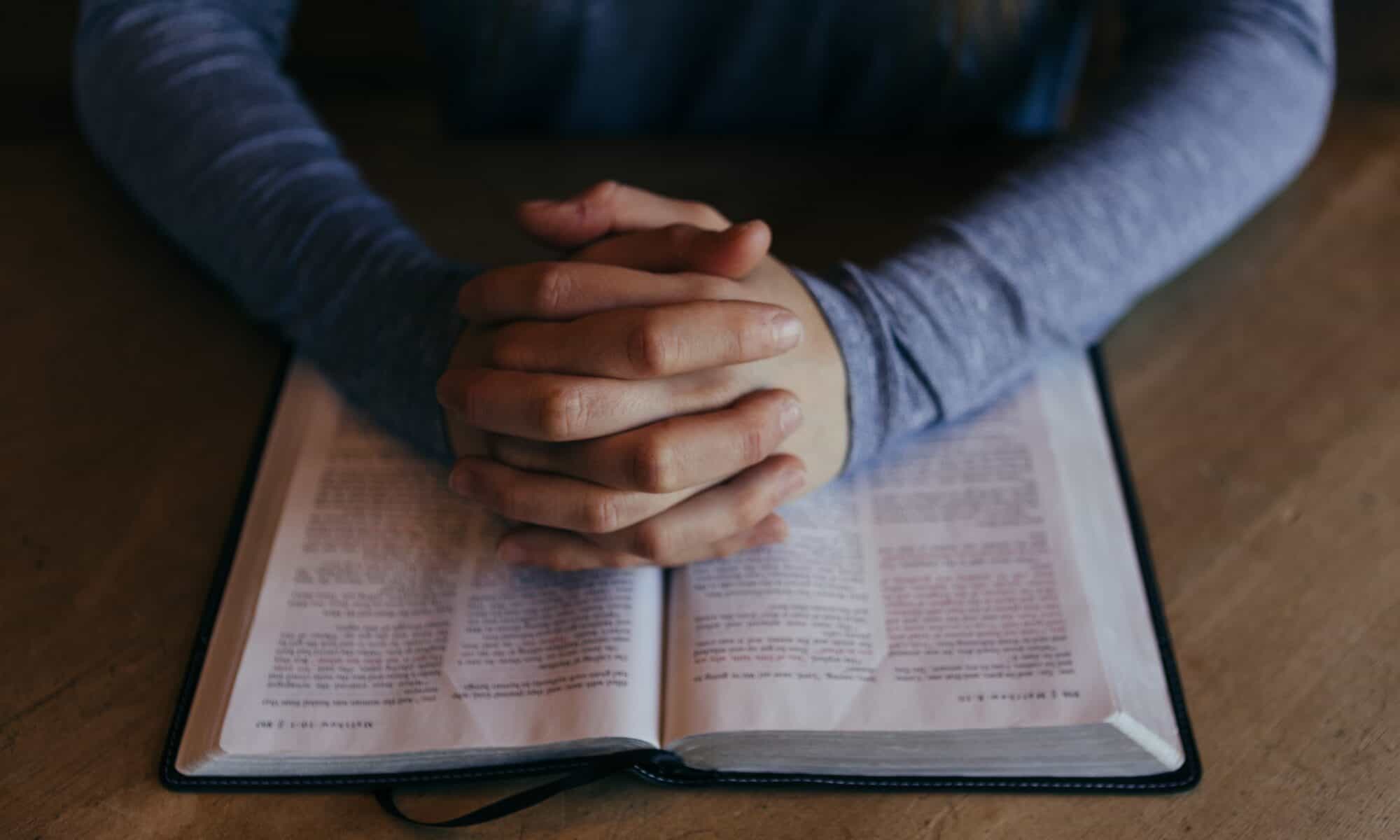 Praying over Bible