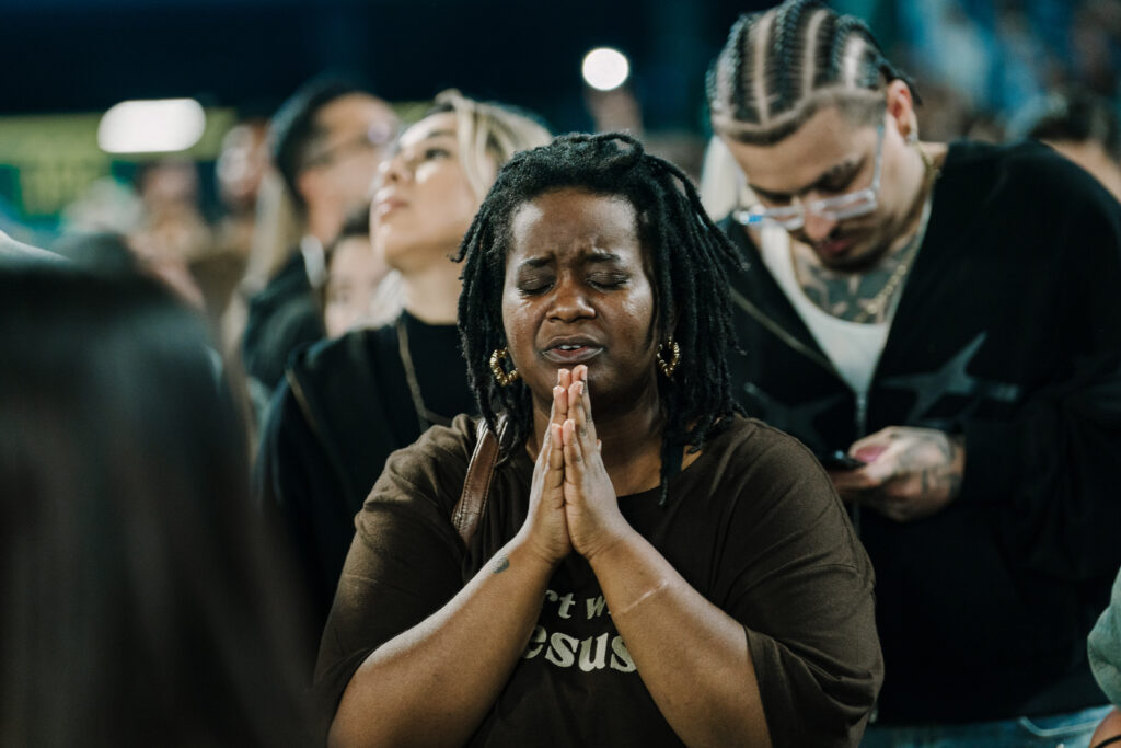 woman makes profession of faith at harvest crusade 2025