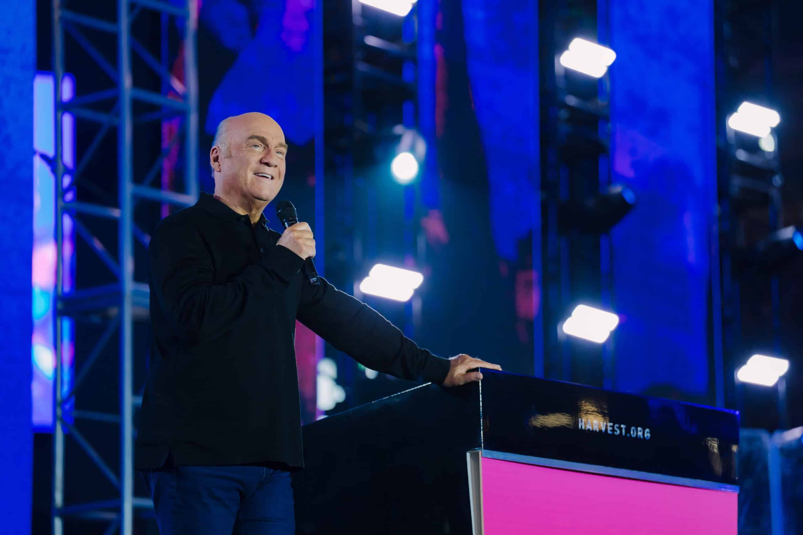 greg laurie at the 2024 harvest crusade at angel stadium preaching on stage