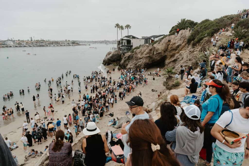 People line up at Pastor Greg Laurie's 2024 Jesus Revolution Baptism at Pirate's Cove