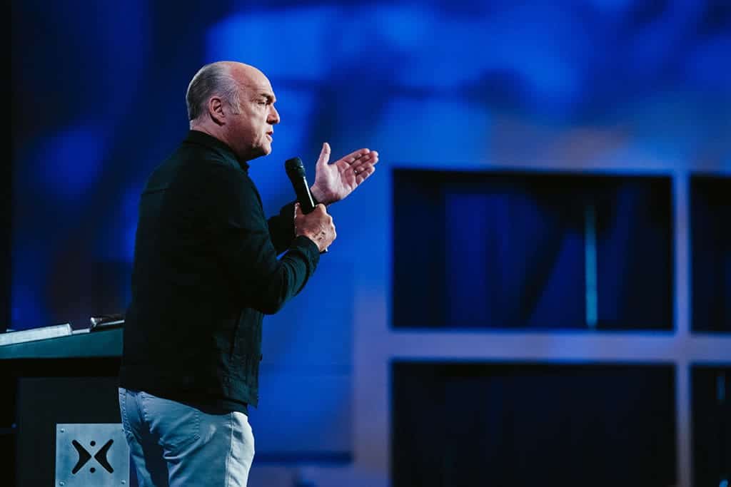 Greg Laurie shares the message Happy Feet at Harvest Christian fellowship taken from the book of Romans